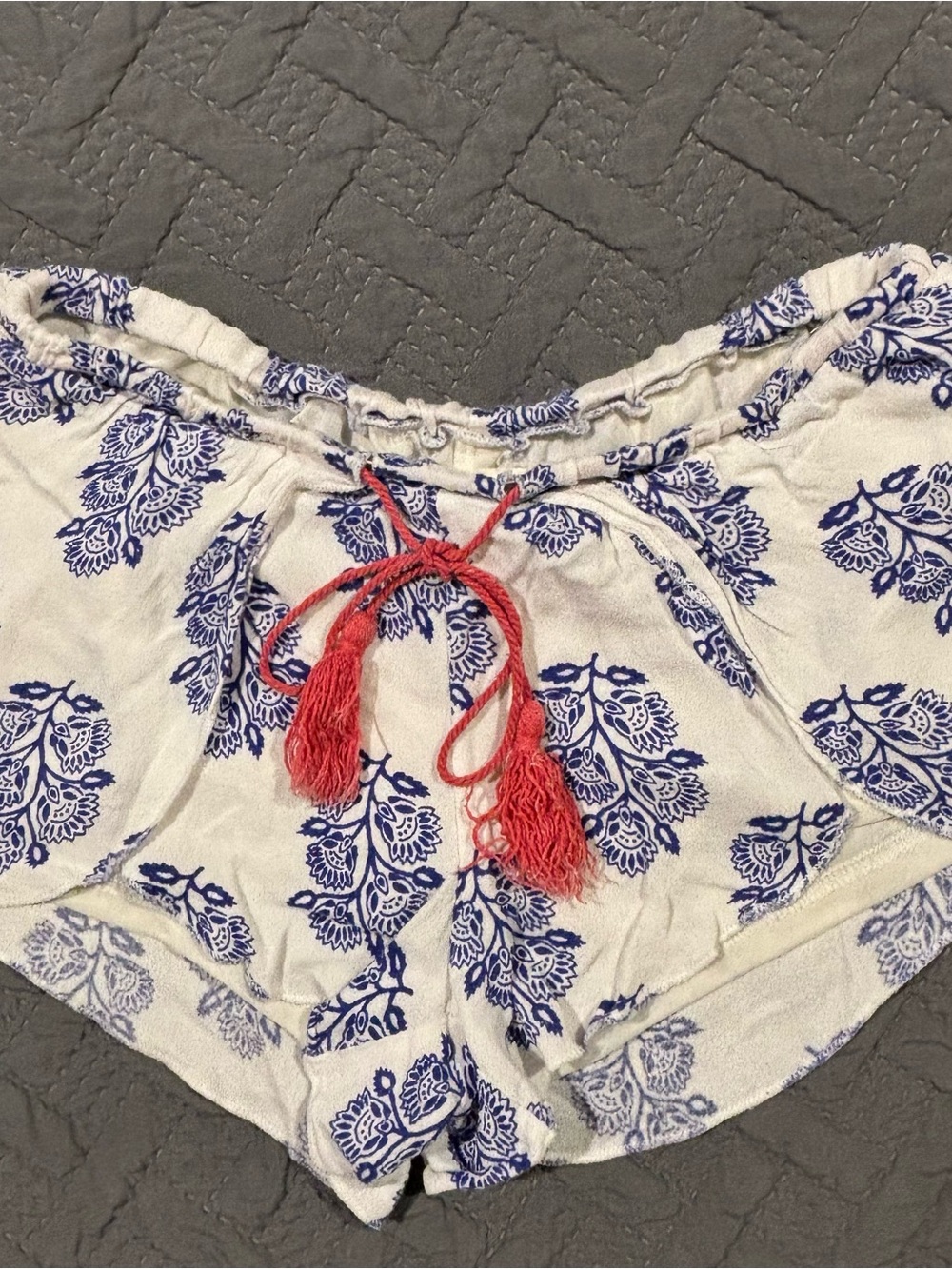 O'Neill White Shorts with Blue Floral Print and Coral Tassel